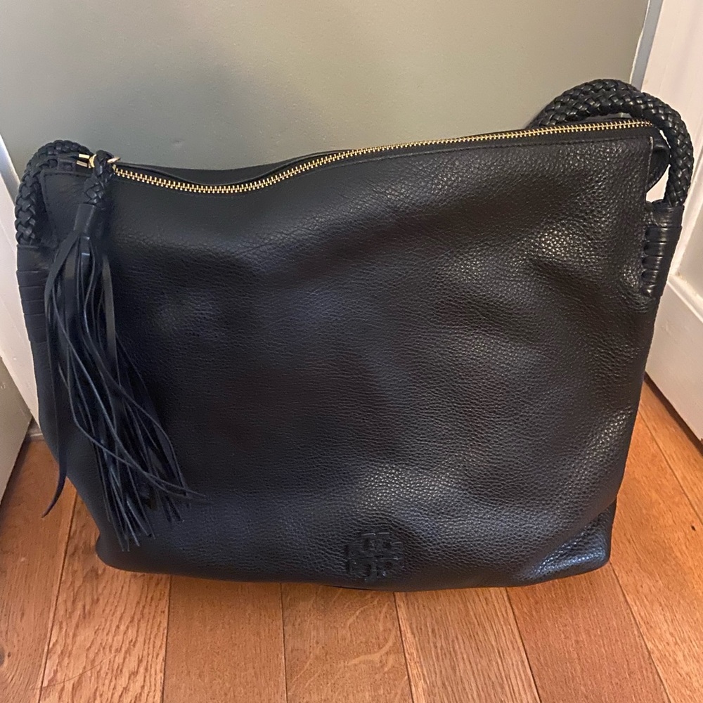 Tory Burch black peddle leather shoulder bag.